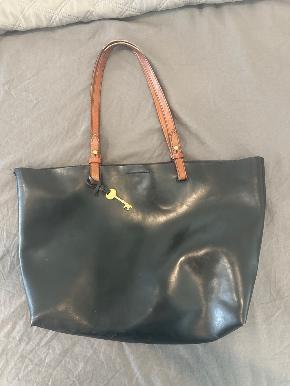 Fossil Black Tote with Brown Leather Handles and Gold Key Charm